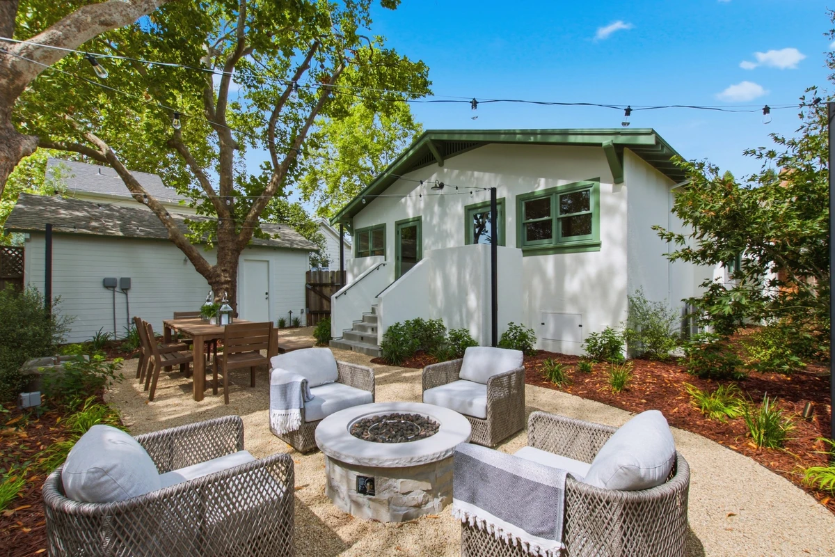 Completed Adams Street garden with seating and a fire pit